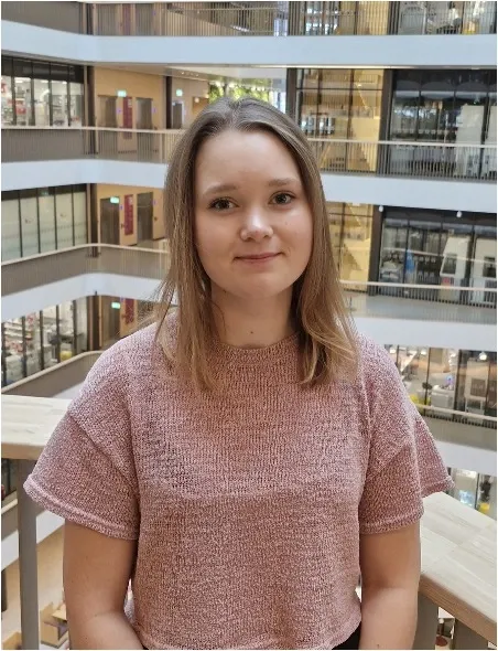 Woman smiling for a portrait.