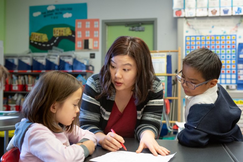 Kindergarden teacher with two children.