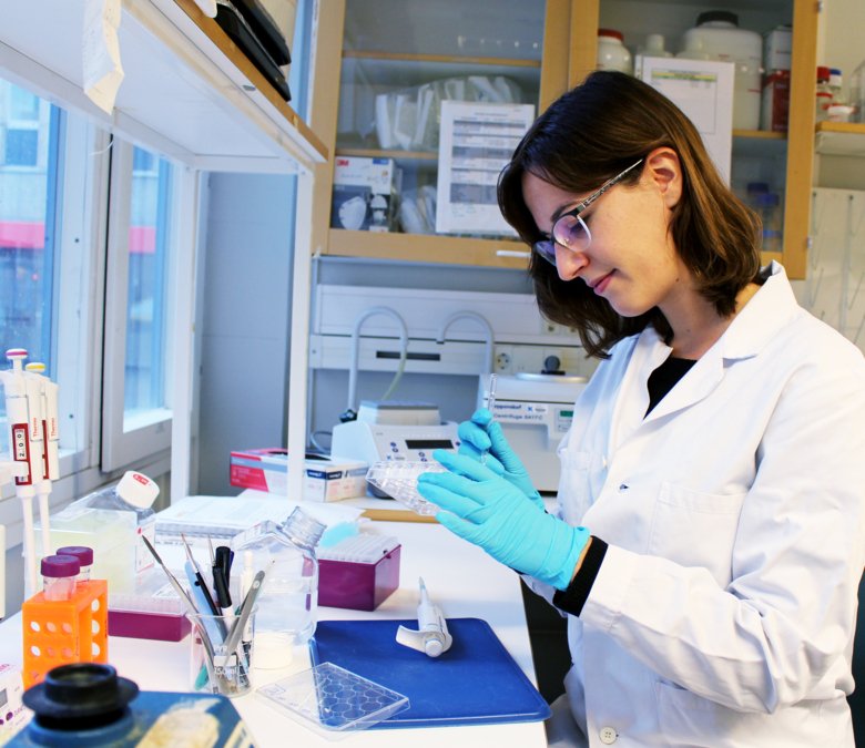 Portrait of Patricia when working in lab environment.