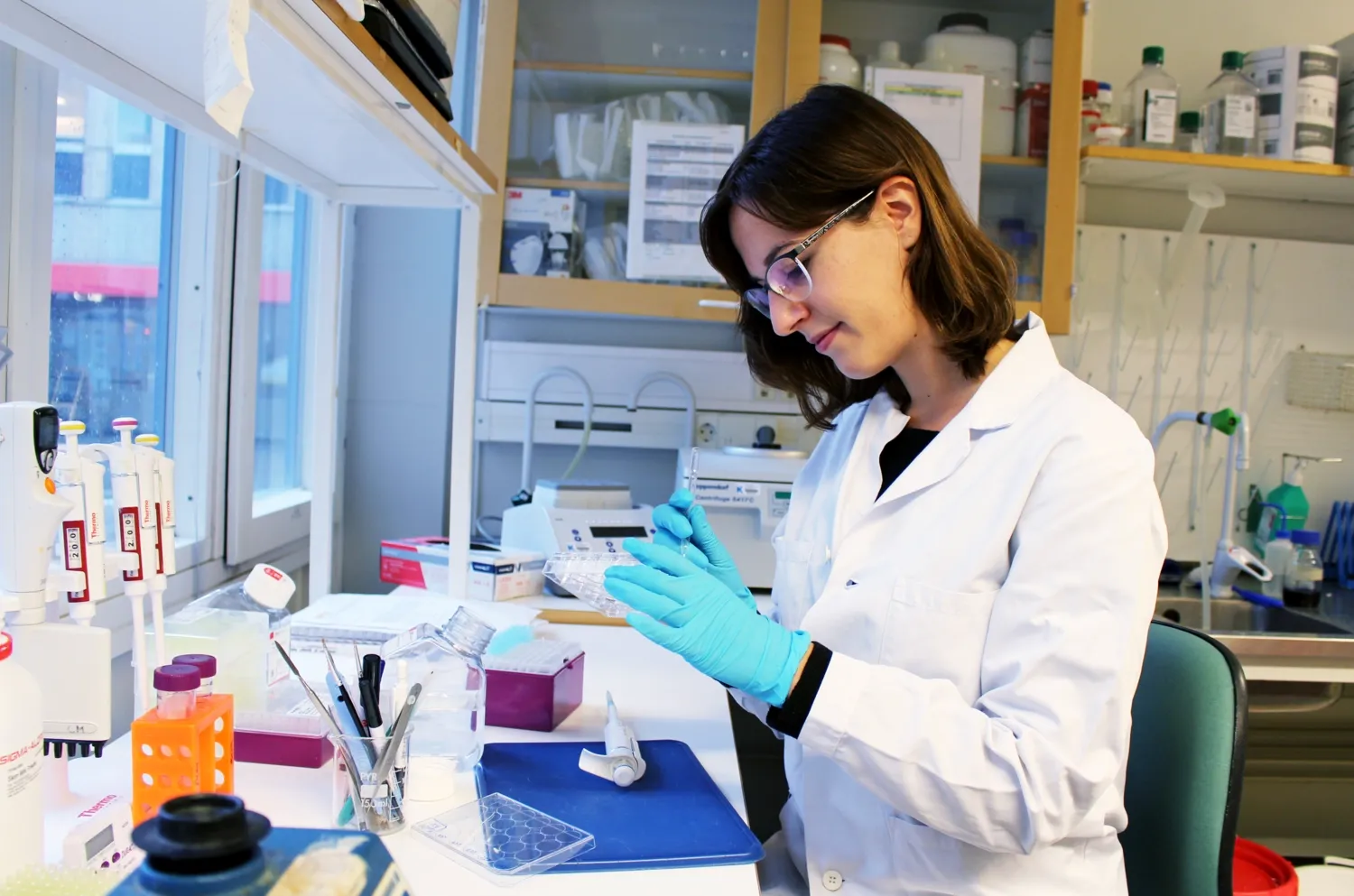 Portrait of Patricia when working in lab environment.