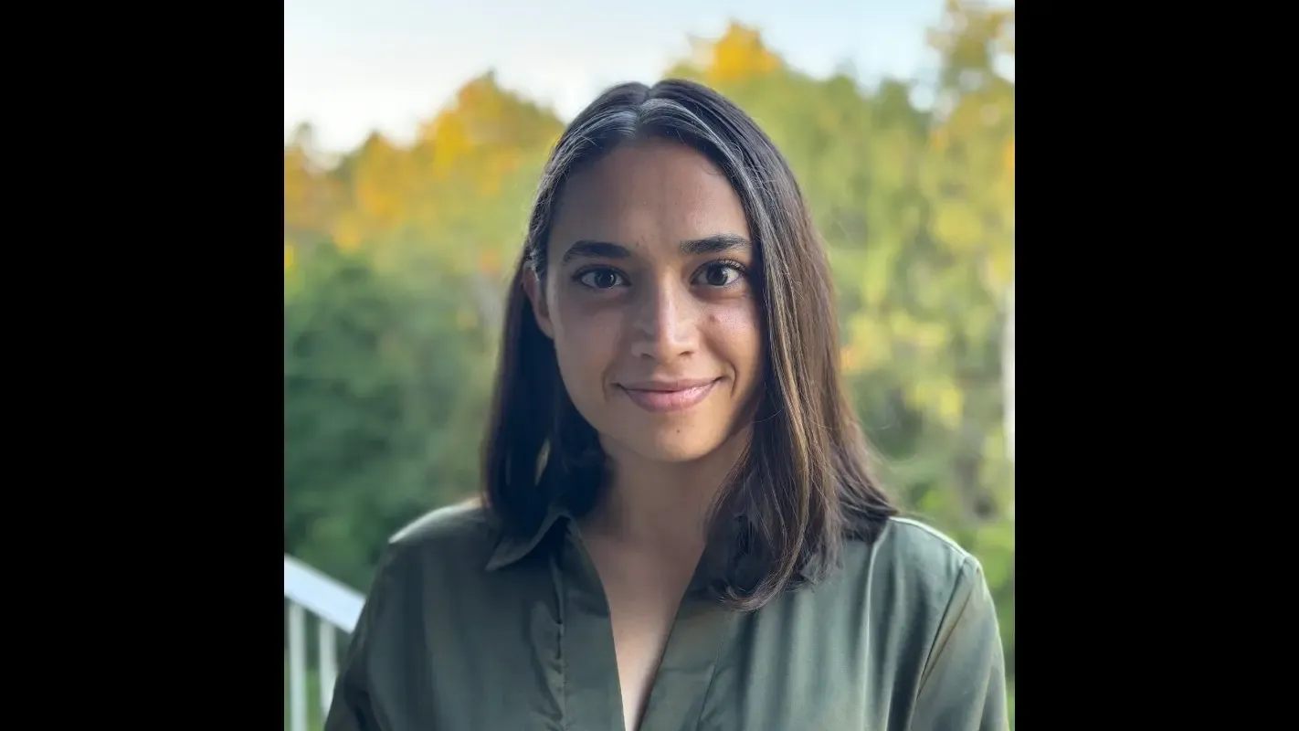 Profile photo of Nitya Bergstand, a woman with dark hair wearing a green blouse