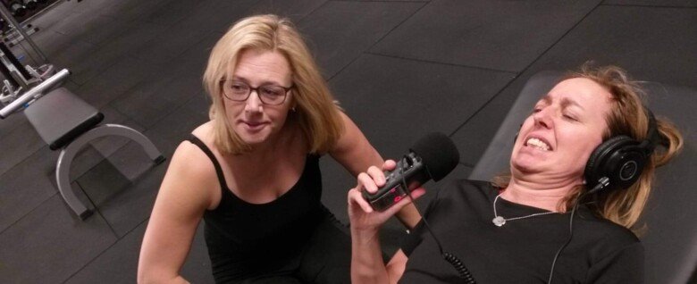 Cecilia lifting in the gym with Jessica as PT.