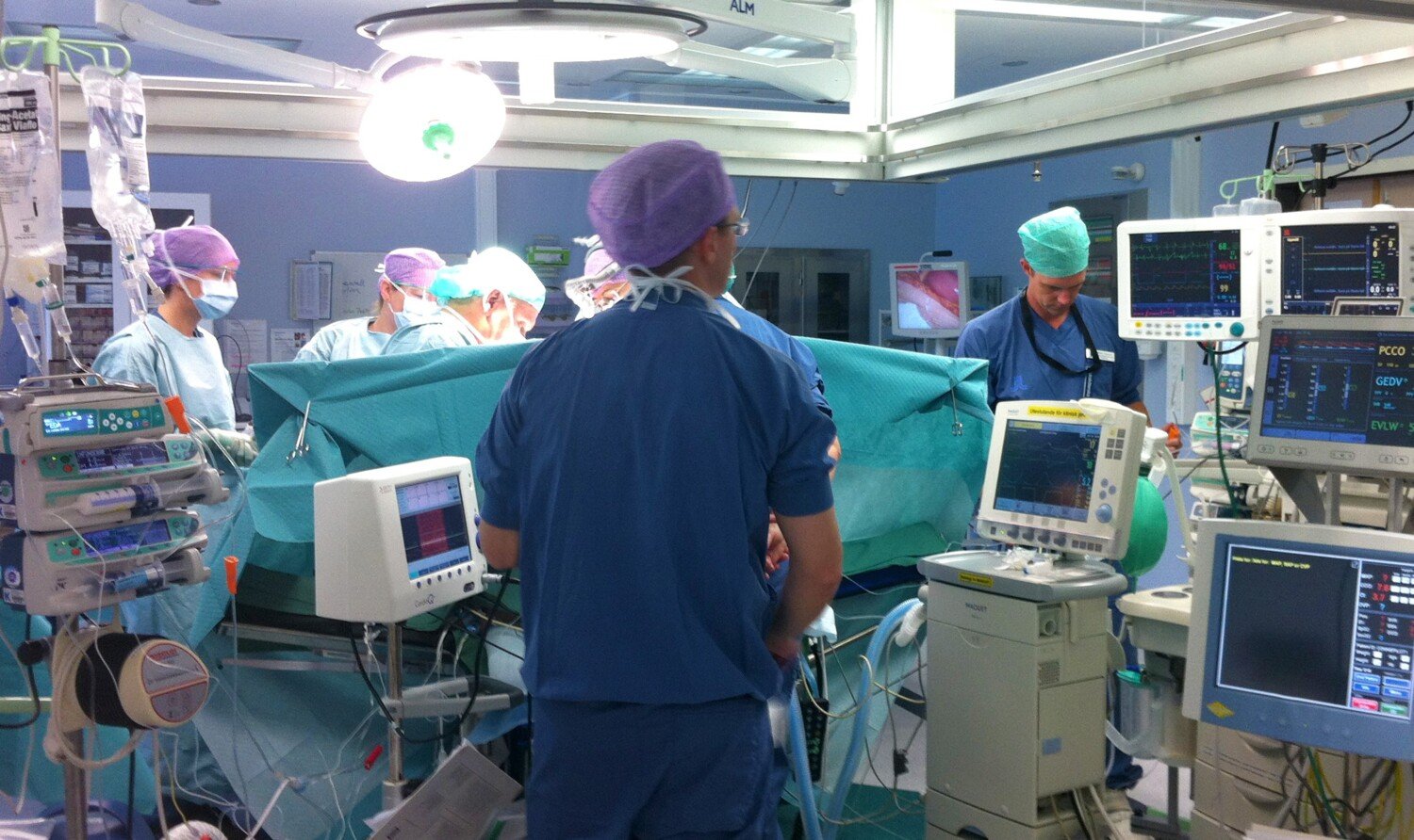 surgical procedure with nurses and surgeons.