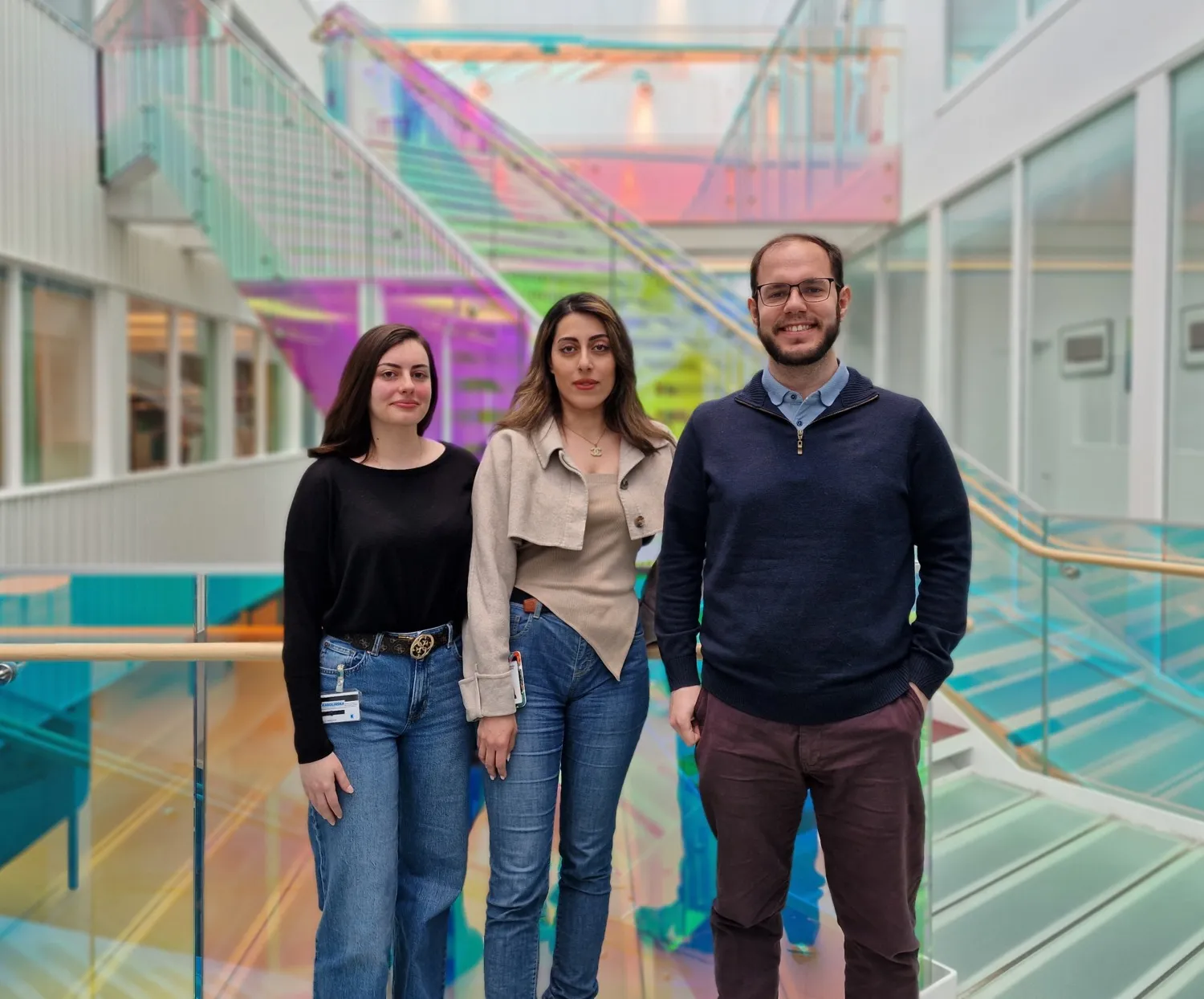 Group photo of three people.